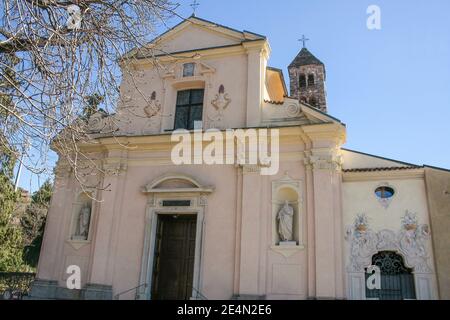 Luino, Province of Varese, region Lombardy, Lake Maggiore (Lago Maggiore). Chiesa di San Pietro (St. Peter's Church). It is the oldest church in Luino, as evidenced by the refined and elegant Romanesque bell tower which is dated by medieval art historians to 1050-1075. The church, on the other hand, was renovated in the mid-seventeenth century with a three-nave layout. Stock Photo