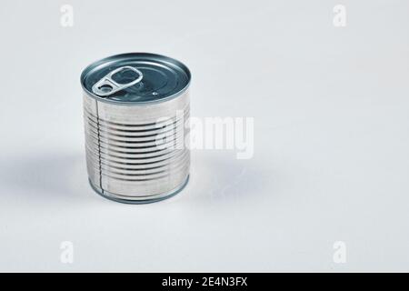 Closed tin can on a white background Stock Photo
