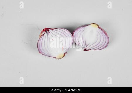 Red sliced onion isolated on white background Stock Photo