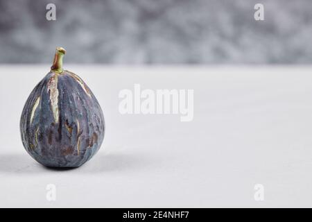 Fresh ripe fig on a white background Stock Photo