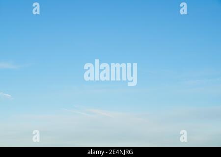 bright blue sky with soft clouds background Stock Photo