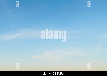 bright blue sky with soft clouds background Stock Photo