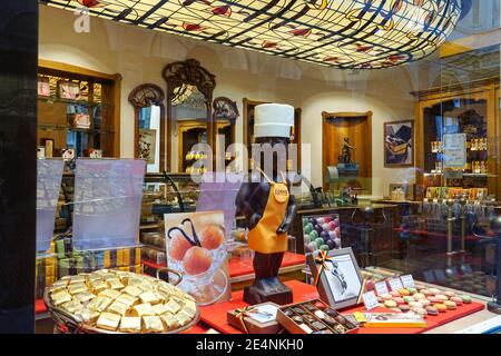 Traditional belgian chocolate shop in Royal Gallery of Saint Hubert, Brussels, Belgium Stock Photo