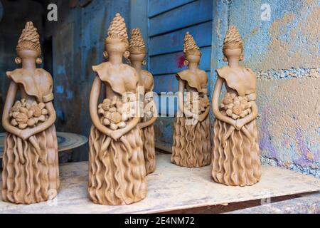 Unfired clay dolls, known as Muñecas Limé or Lime Doll, wait to be fired and then painted in beautiful colors near El Higuerito, Dominican Republic. Stock Photo