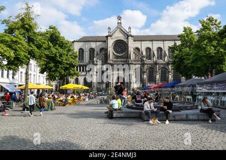 People and restaurants next to Saint Catherine Church in Brussels, Belgium Stock Photo