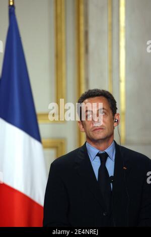 President Nicolas Sarkozy holds a news conference after the 20th French ...