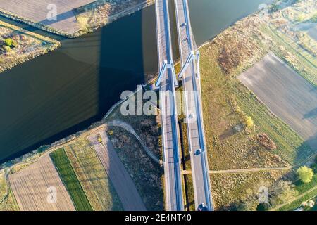 New modern double cable-stayed three-lane bridge over Vistula River in Krakow, Poland. Aerial view from above. Part of the ring road around Krakow Stock Photo