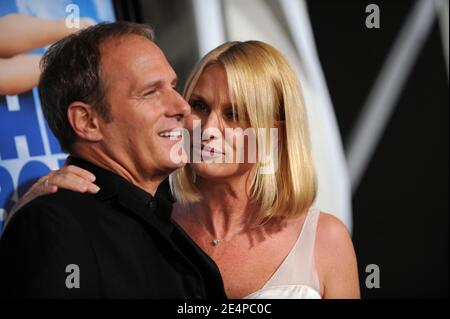 Michael Bolton and girlfriend Nicollette Sheridan attend the premiere