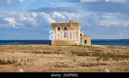 XVI Century Antique Defensive Tower Torre Guaceto At In The Middle Of A Natural Reserve Along The Coast Of Apulia Italy Stock Photo