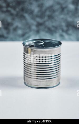 Closed tin can on a white background Stock Photo