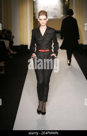 A model presents a creation by British designer John Galliano for ...