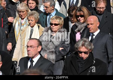Henri Salvador's widow and relatives leaving the funeral mass of French singer Henri Salvador at the Madeleine church in Paris, France on February 16, 2008. Salvador died at the age of 90 of an aneurysm at his Paris home on February 13. Photo by ABACAPRESS.COM Stock Photo