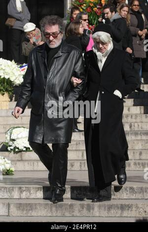 Eddy Mitchell and Francoise Hardy leaving the funeral mass of French singer Henri Salvador at the Madeleine church in Paris, France on February 16, 2008. Salvador died at the age of 90 of an aneurysm at his Paris home on February 13. Photo by ABACAPRESS.COM Stock Photo