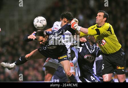 Bordeaux' Franck Jurietti, Lyon's Fred and Bordeaux' goalkeeper Ulrich Rame during a confuse action at the French First League Soccer match, Olympique Lyonnais vs Girondins de Bordeaux at the Gerland stadium in Lyon, France on March 9, 2008. Olympique Lyonnais defeats Girondins de Bordeaux 4-2. Photo by Steeve McMay/Cameleon/ABACAPRESS.COM Stock Photo