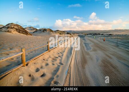 Road through sand dunes in Guadalupe-Nipomo Dunes National Wildlife reserve, California Stock Photo