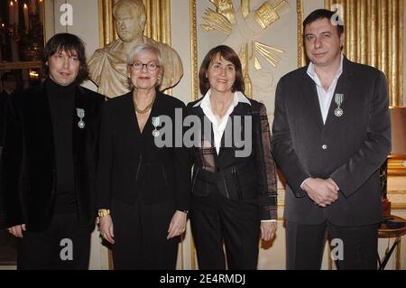 'Play it again Sam' presidents Kenny Gates and Michel Lambot, Midem's Vice-president Brigitte Chaintreau are honored with the 'Commandeur des Arts et Lettres' medal by Culture Minister Christine Albanel (C) at her ministry in Paris, France, on March 20, 2008. Photo by Giancarlo Gorassini/ABACAPRESS.COM Stock Photo