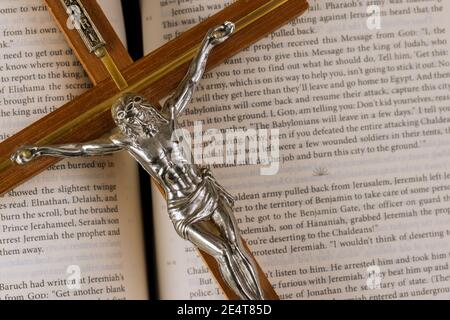 22 JANUARY 21 New York US 2021: Holy Bible on the background of the Christian cross the hope of mankind for salvation on way to God through prayer. Stock Photo