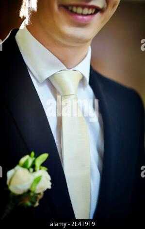 Smiling man in tie, jacket and shirt. Smiling man in tie, jacket and shirt. Stock Photo