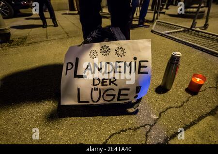 Munich, Bavaria, Germany. 24th Jan, 2021. ''Plandemie'' indicating the belief Corona is a hoax. On the heels of a court win with the Verwaltungsgerichtshof, Markus Haintz of the Querdenken group organized an anti-mask, anti-anti-Corona measure demonstration in front of the Verwaltungsgerichtshof in Munich, Germany. Approximately 250 were in attendance and displayed a jump in radicalization and propensity for violence against media representatives not seen prior to the end of the Trump era. At one point, media representatives were swarmed, physically attacked and prevented from working as Stock Photo