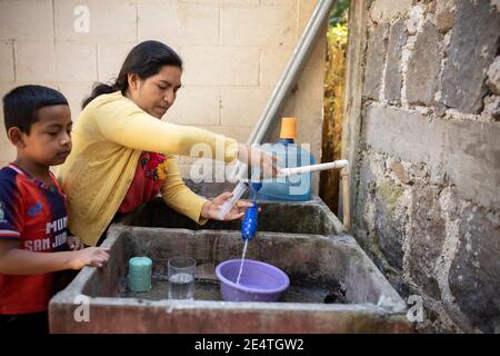 Home tap-based water filter system in use in San Juan la Laguna, Guatemala. Stock Photo