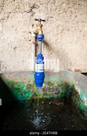 Home tap-based water filter system in use in San Juan la Laguna, Guatemala. Stock Photo