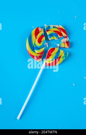 Colorful lollipop on blue background Stock Photo