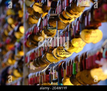 Locks put on bridge railing a as a symbol of Love and Union in Ljubljana Stock Photo