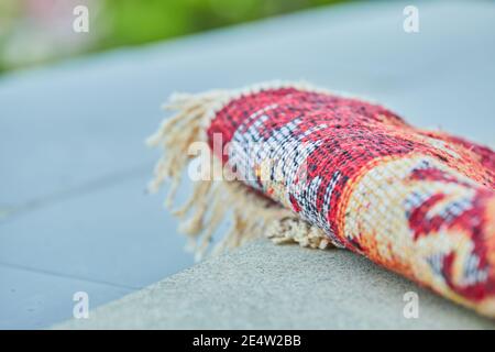 Small carved rug on white background Stock Photo