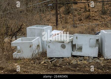 Concrete pipes to construct drainage systems on large cement drainage pipes for industrial building construction, selective focus. Stock Photo