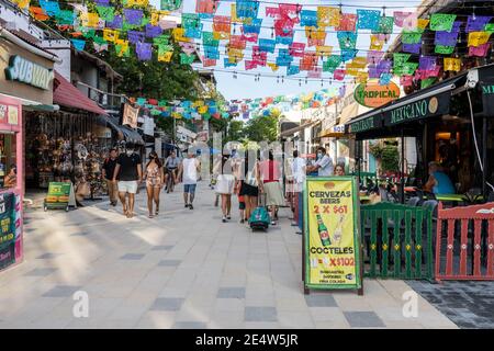 Shoppers on 5th street in Playa del Carmen Stock Photo