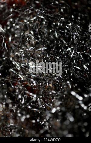 Metal wire dish cleaner macro modern high quality print Stock Photo