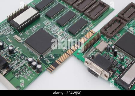 Two graphic card for personal computer. Isolated on the white background. Retro technology. Stock Photo