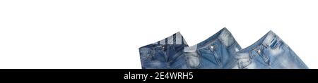 Waist and front pockets areas of three pairs of blue jeans slightly tilted on white background. Isolated. Banner. Copy space. Shopping, trade, sale, s Stock Photo