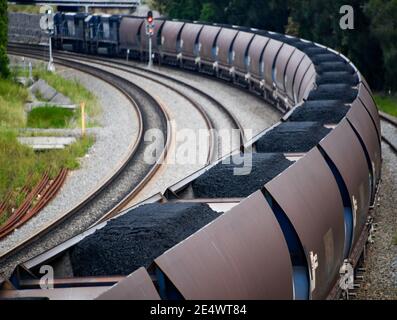 Black Coal Being Shipped by Rail to Port of Newcastle for Export - Hunter Valley Australia Stock Photo