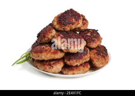 Fried meat cutlets on a plate isolated on white background Stock Photo