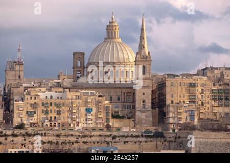 view of Valletta with the belltower of St. Paul Pro-Cathedral and dome of Carmelite Church Stock Photo