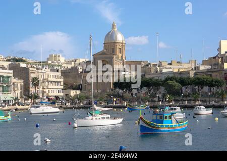view on the bay of Kalkara Creek with St. Joseph Church, Malta Stock Photo