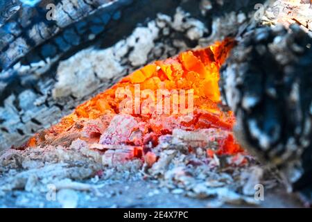 Flames smoke and hot coals of fire.Brazier of hot coals. Stock Photo
