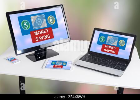 Money saving concept shown on different information technology devices Stock Photo