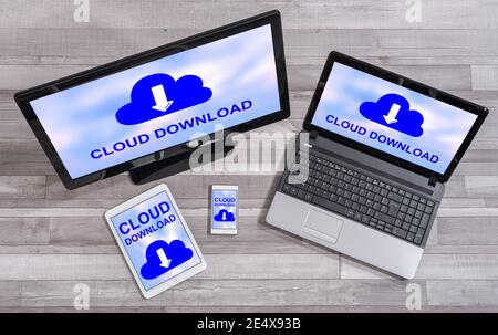 Data download concept shown on different information technology devices Stock Photo