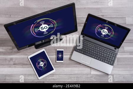 5g concept shown on different information technology devices Stock Photo