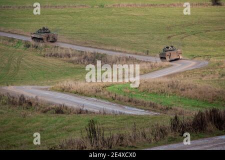 british army warrior tracked armoured vehicle on maneuvers in a show of firepower Stock Photo