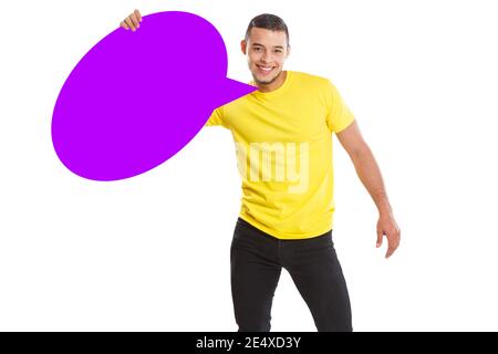 Young latin man holding empty speech bubble with copyspace copy space isolated on a white background Stock Photo