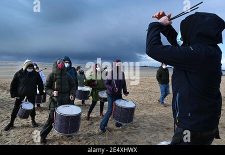 Toujours Vivants (Always Alive) event bringing together those involved in the culture of the Manche, in Montmartin-sur-Mer, France, on January 24, 2021. About 400 people gathered on the beach of Montmartin-sur-Mer,have formed a human chain revealing the word 'alive', to continue to fight in these times of Covid-19. Photo by Desfoux JY/ANDBZ/ABACAPRESSS.COM Stock Photo