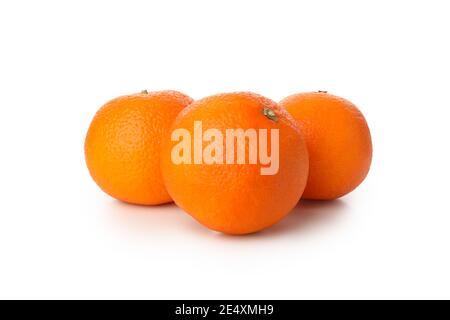 Three ripe sweet mandarins with leaves isolated on white, a trio of juicy mandarins, fresh mandarins for a vitamin snack Stock Photo