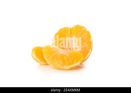Half of mandarin and pieces isolated on white background Stock Photo