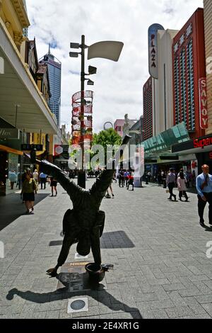 Perth, WA, Australia - November 28, 2017: Unidentified people and sculpture of a street artist on Hay Street in downtown of the capital in Western Aus Stock Photo