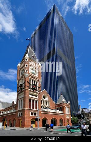 Perth, WA, Australia, November 28, 2017: Unidentified people at old town hall building with modern skyscraper behind Stock Photo