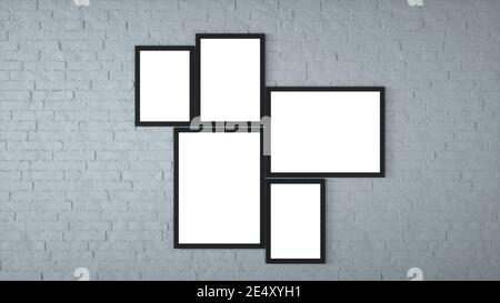 Different size framed photos hanging on the grey wall. 3d rendering Stock Photo