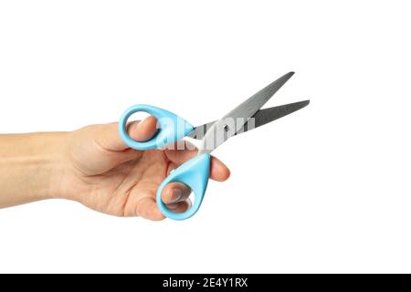 Female hand with scissors isolated on white background Stock Photo
